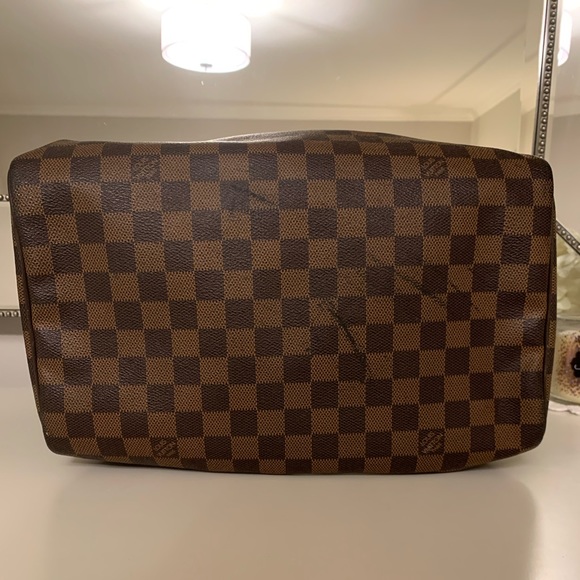 Damier Ebene Speedy 30 Louis Vuitton
Top Handle Bag
Includes Lock - Picture 6 of 6